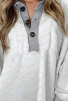 White Textured Side Pockets Buttoned Neckline Sweatshirt