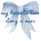 White t-shirt with a large blue bow and the phrase “my favorite love story is ours”—perfect for brides, wives, and romantic occasions.