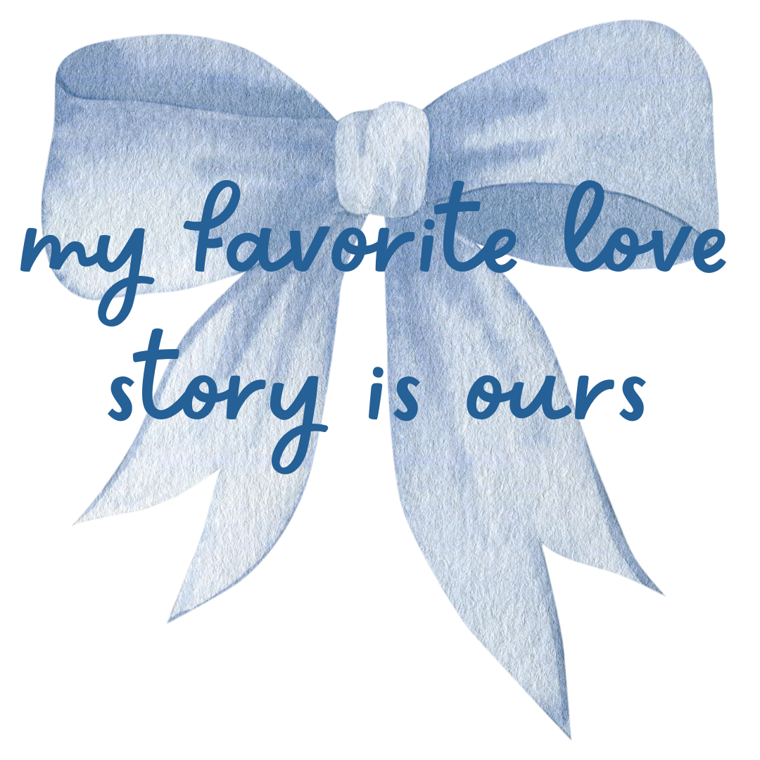White t-shirt with a large blue bow and the phrase “my favorite love story is ours”—perfect for brides, wives, and romantic occasions.