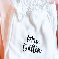 Personalized bride and wifey sweatpants in soft fabric, cozy loungewear for brides, wives, and honeymoon travel.