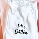 Personalized bride and wifey sweatpants in soft fabric, cozy loungewear for brides, wives, and honeymoon travel.