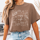 Cozy Bride and Cozy Wife fall graphic t-shirts in soft cotton, perfect for brides and wives to celebrate autumn, wedding planning, and wife life.
