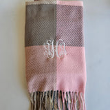 Fall plaid scarf in soft autumn tones with fringe edges, perfect cozy accessory for brides and wives to stay warm and stylish in the season.