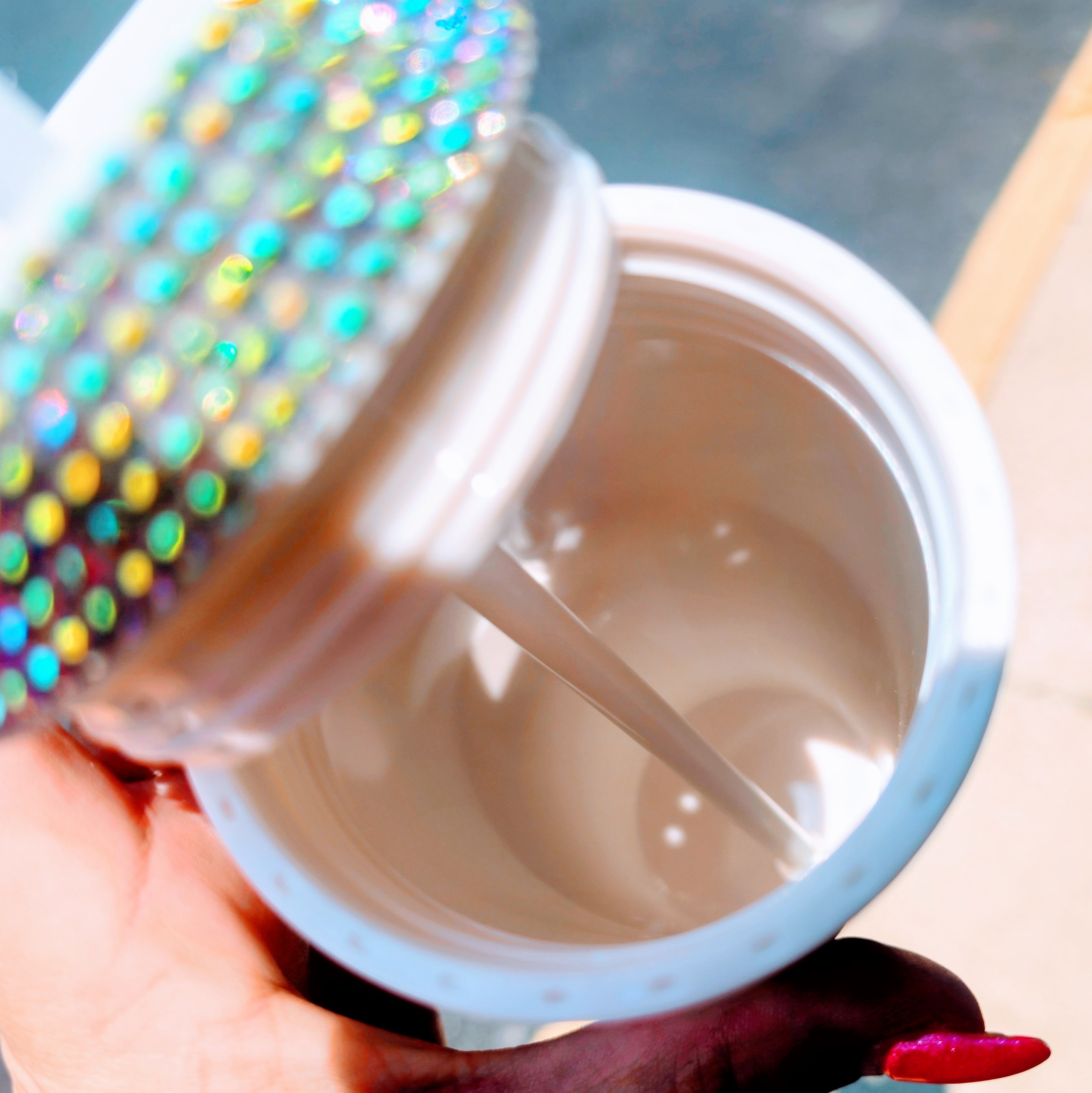 16oz white tumbler with rhinestone exterior and bold “BRIDE” lettering, featuring a clear lid and straw—perfect for weddings, bachelorettes, and brides-to-be.