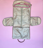 White and brown foldable weekender travel bag with leather-style straps, perfect for brides on the go.