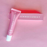 Hydrating lip balm in a sleek pink tube, perfect for brides and wives to keep lips soft, smooth, and kiss-ready for weddings, honeymoons, or daily use.