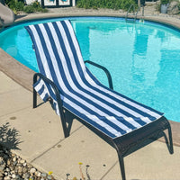 Navy and white striped lounge chair towel cover with side pockets, displayed poolside—perfect for brides and wives on honeymoon or summer getaways.