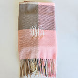 Fall plaid scarf in soft autumn tones with fringe edges, perfect cozy accessory for brides and wives to stay warm and stylish in the season.