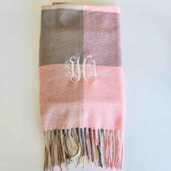 Fall plaid scarf in soft autumn tones with fringe edges, perfect cozy accessory for brides and wives to stay warm and stylish in the season.