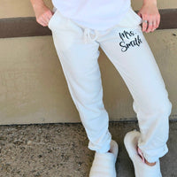 Personalized bride and wifey sweatpants in soft fabric, cozy loungewear for brides, wives, and honeymoon travel.
