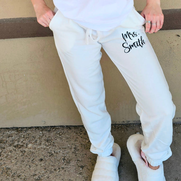 Personalized bride and wifey sweatpants in soft fabric, cozy loungewear for brides, wives, and honeymoon travel.