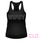 A black racerback tank top with the word 'WIFEY' printed across the chest in white outlined letters filled with a dark pattern. The image is on a white background with a pink 'Crafty Lady Boutique' watermark in the bottom right corner.