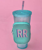 Mint green tumbler pouch with glitter monogram, securely wrapped around a textured blue tumbler, perfect for brides to carry small essentials hands-free.