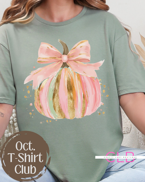 ✨ Celebrate fall in style with our hand-painted pink pumpkin bow tee 🎃🎀 Perfect for brides & wives who love cozy, artistic fashion!