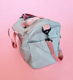 Sage green duffel bag with mauve handles and rose gold foil personalized name