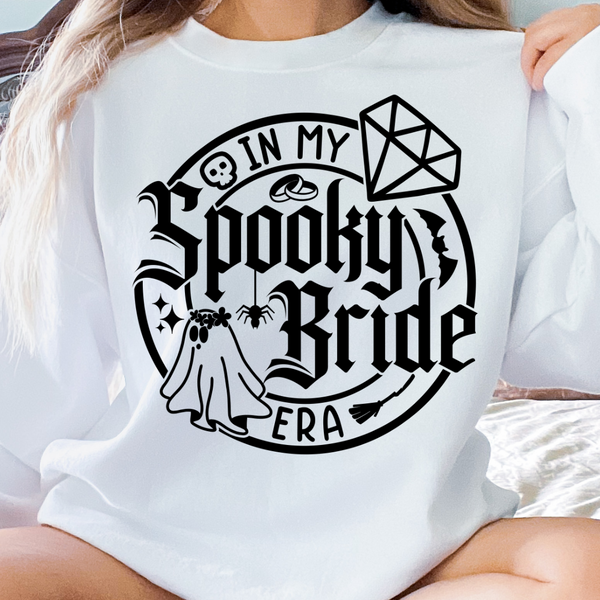 In My Bride Era tee, bride pullover sweatshirt, white bride top, bridal ghost and bats design, black writing bride shirt, cute bride apparel, bridal shower outfit, bachelorette party sweatshirt, stylish bride to be clothing, wedding preparation wear, match with black future mrs sunglasses